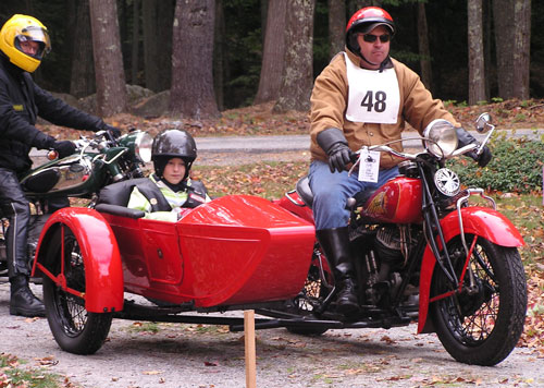 Emily Gibson (sidecar) ready to ride with Chris Pederson on the vintage Indian!