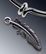 Feather charm