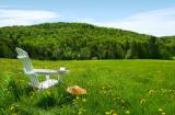 Photo of NH hills with Adirondack chair